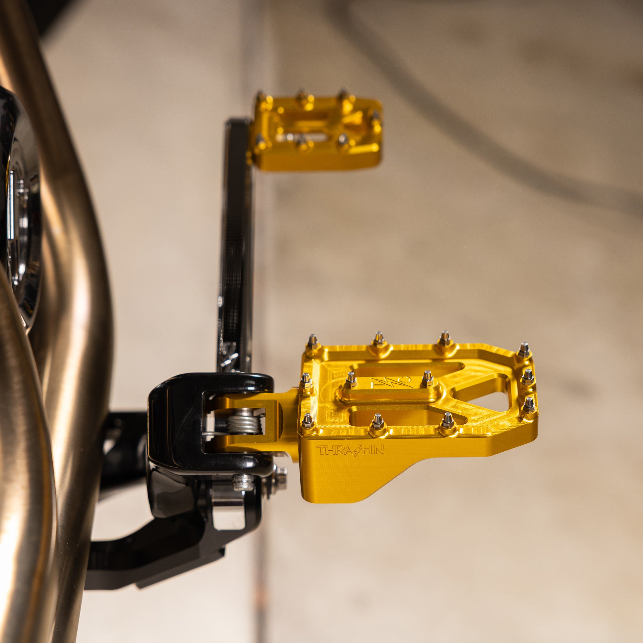 Thrashin Supply® Aggressor Foot Pegs | Dyna, Sportster, FXR