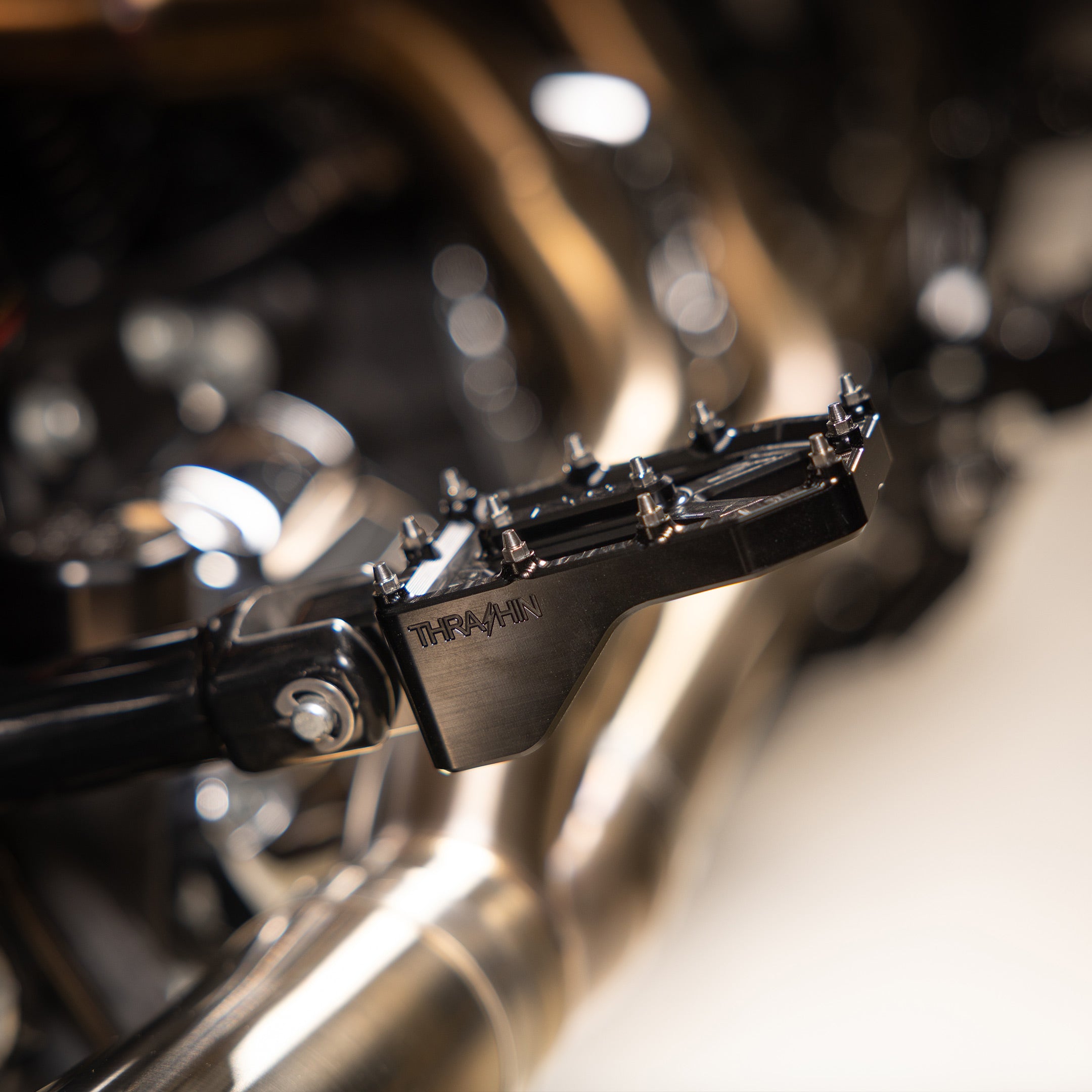 Thrashin Supply® Aggressor Foot Pegs | Dyna, Sportster, FXR